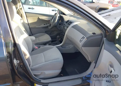 2009 Toyota Corolla Le from USA, damaged, VIN 1NXBU40E09Z048065